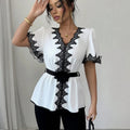 White V-Neck Blouse with Black Lace Trim Belted Peplum Hem